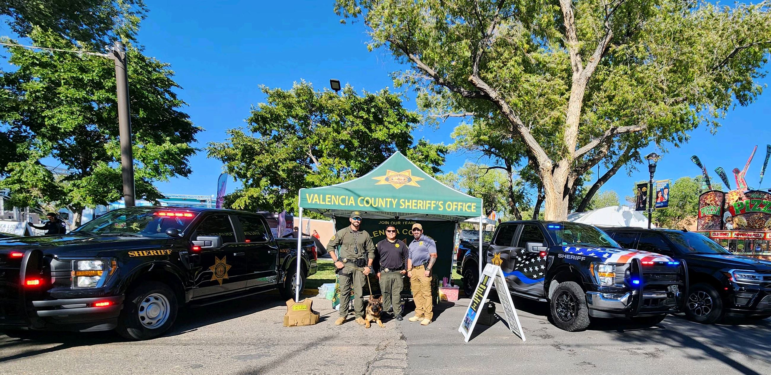 Deputies hosting the Valencia County Sheriff's Office booth at the LE Appreciation Day